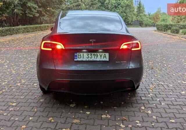 Серый Тесла Model Y, объемом двигателя 0 л и пробегом 115 тыс. км за 26500 $, фото 2 на Automoto.ua