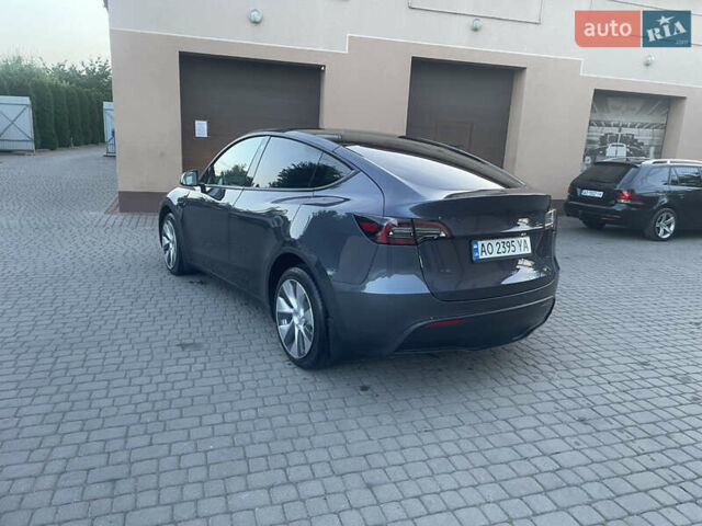 Сірий Тесла Model Y, об'ємом двигуна 0 л та пробігом 59 тис. км за 26900 $, фото 24 на Automoto.ua