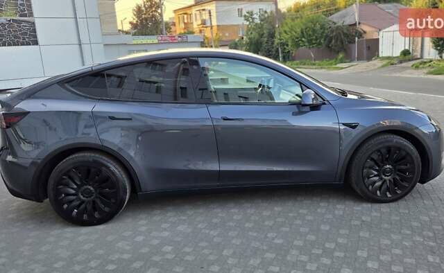 Серый Тесла Model Y, объемом двигателя 0 л и пробегом 77 тыс. км за 25499 $, фото 7 на Automoto.ua