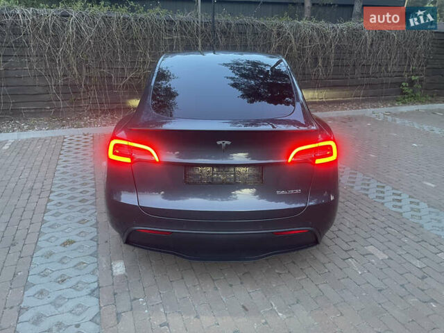 Сірий Тесла Model Y, об'ємом двигуна 0 л та пробігом 69 тис. км за 29999 $, фото 30 на Automoto.ua