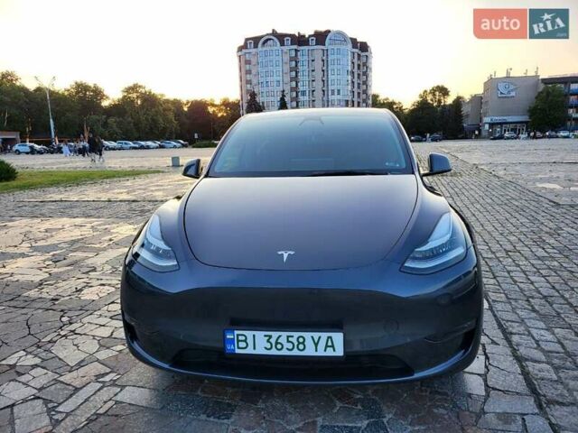 Серый Тесла Model Y, объемом двигателя 0 л и пробегом 49 тыс. км за 26950 $, фото 16 на Automoto.ua