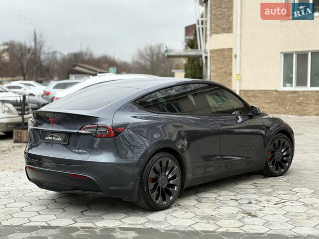 Серый Тесла Model Y, объемом двигателя 0 л и пробегом 53 тыс. км за 28000 $, фото 24 на Automoto.ua