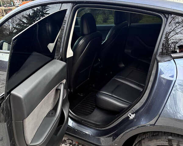 Серый Тесла Model Y, объемом двигателя 0 л и пробегом 82 тыс. км за 26500 $, фото 11 на Automoto.ua