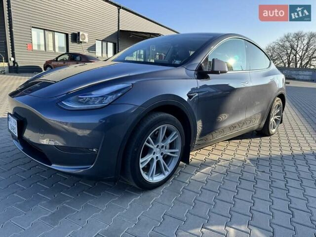 Серый Тесла Model Y, объемом двигателя 0 л и пробегом 135 тыс. км за 24500 $, фото 1 на Automoto.ua