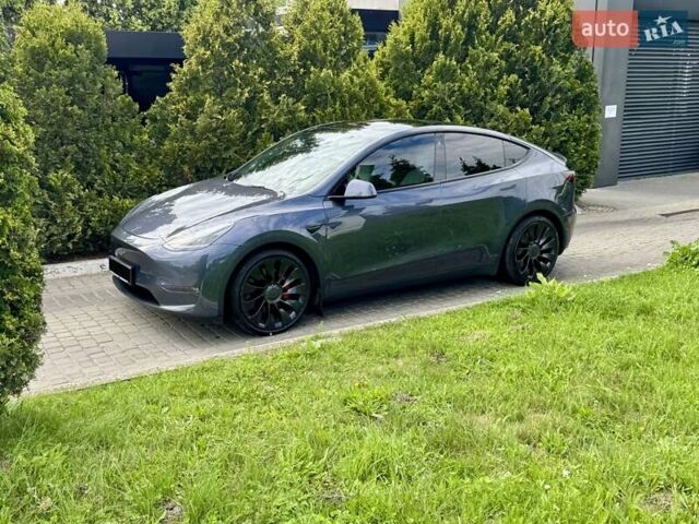 Серый Тесла Model Y, объемом двигателя 0 л и пробегом 28 тыс. км за 40865 $, фото 1 на Automoto.ua