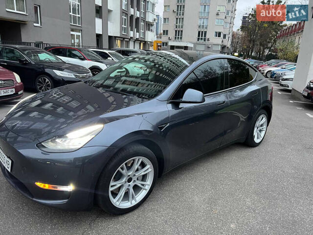Серый Тесла Model Y, объемом двигателя 0 л и пробегом 35 тыс. км за 28900 $, фото 1 на Automoto.ua