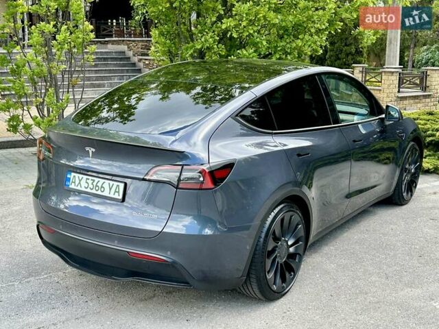 Серый Тесла Model Y, объемом двигателя 0 л и пробегом 56 тыс. км за 28500 $, фото 4 на Automoto.ua