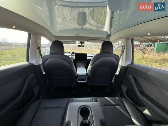 Серый Тесла Model Y, объемом двигателя 0 л и пробегом 84 тыс. км за 22999 $, фото 11 на Automoto.ua