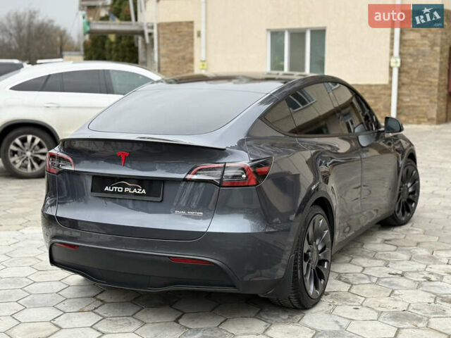 Серый Тесла Model Y, объемом двигателя 0 л и пробегом 53 тыс. км за 28000 $, фото 22 на Automoto.ua