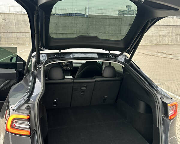 Серый Тесла Model Y, объемом двигателя 0 л и пробегом 58 тыс. км за 28500 $, фото 28 на Automoto.ua