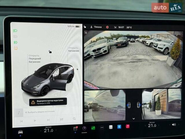 Серый Тесла Model Y, объемом двигателя 0 л и пробегом 85 тыс. км за 23900 $, фото 35 на Automoto.ua