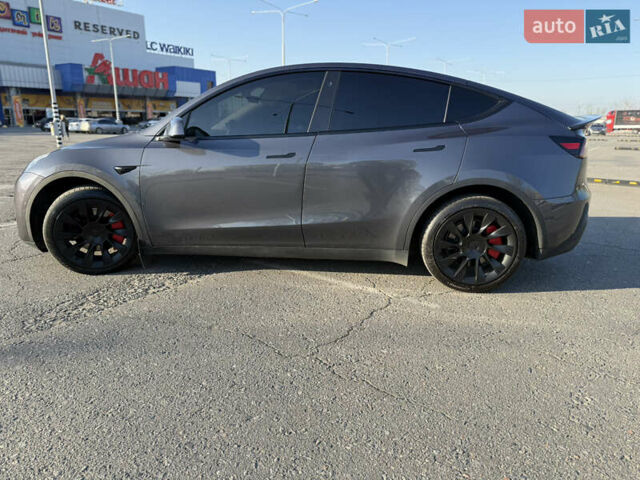 Серый Тесла Model Y, объемом двигателя 0 л и пробегом 99 тыс. км за 24999 $, фото 6 на Automoto.ua