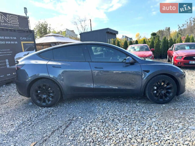 Серый Тесла Model Y, объемом двигателя 0 л и пробегом 85 тыс. км за 24500 $, фото 1 на Automoto.ua