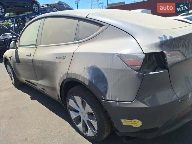 Серый Тесла Model Y, объемом двигателя 0 л и пробегом 86 тыс. км за 17300 $, фото 2 на Automoto.ua