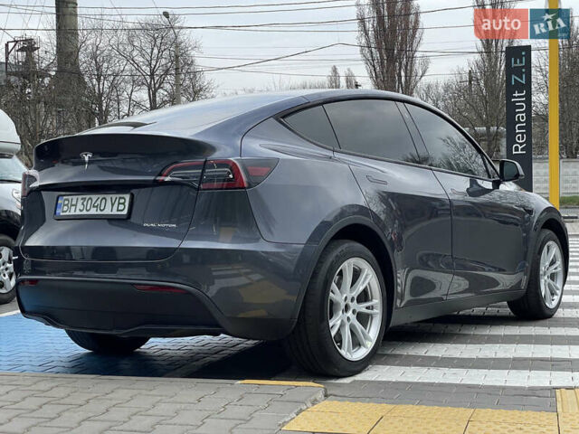 Серый Тесла Model Y, объемом двигателя 0 л и пробегом 44 тыс. км за 29900 $, фото 4 на Automoto.ua