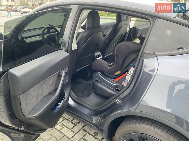 Серый Тесла Model Y, объемом двигателя 0 л и пробегом 56 тыс. км за 35370 $, фото 2 на Automoto.ua