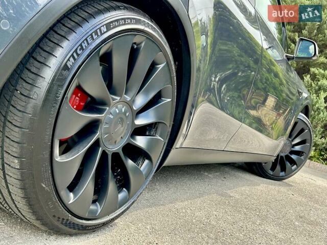 Серый Тесла Model Y, объемом двигателя 0 л и пробегом 56 тыс. км за 28500 $, фото 2 на Automoto.ua