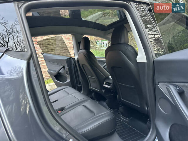Серый Тесла Model Y, объемом двигателя 0 л и пробегом 95 тыс. км за 24900 $, фото 13 на Automoto.ua