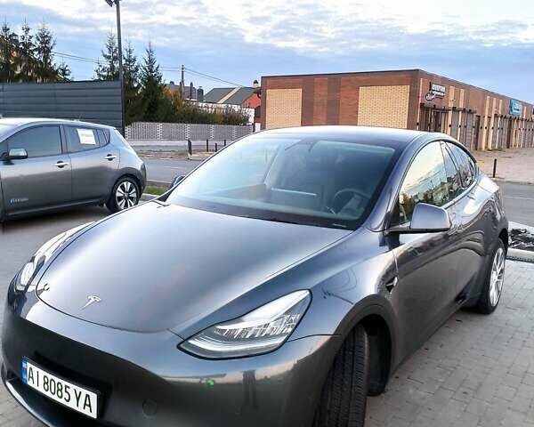Серый Тесла Model Y, объемом двигателя 0 л и пробегом 74 тыс. км за 26999 $, фото 16 на Automoto.ua
