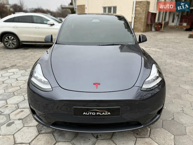 Серый Тесла Model Y, объемом двигателя 0 л и пробегом 53 тыс. км за 28000 $, фото 1 на Automoto.ua