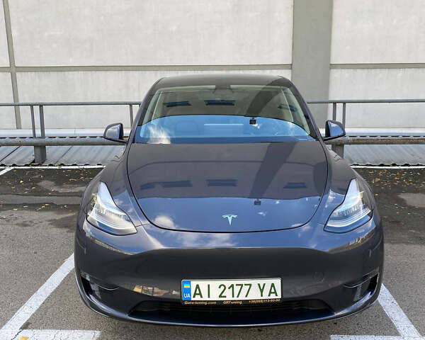 Серый Тесла Model Y, объемом двигателя 0 л и пробегом 57 тыс. км за 43000 $, фото 1 на Automoto.ua