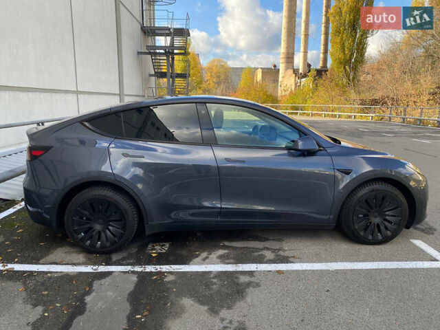 Серый Тесла Model Y, объемом двигателя 0 л и пробегом 57 тыс. км за 43000 $, фото 4 на Automoto.ua