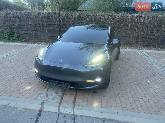 Сірий Тесла Model Y, об'ємом двигуна 0 л та пробігом 69 тис. км за 29999 $, фото 7 на Automoto.ua