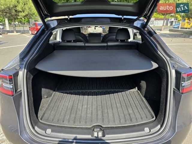 Серый Тесла Model Y, объемом двигателя 0 л и пробегом 34 тыс. км за 27500 $, фото 41 на Automoto.ua