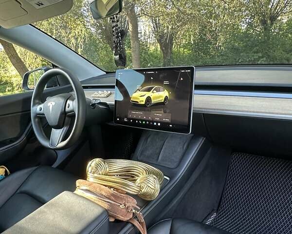 Серый Тесла Model Y, объемом двигателя 0 л и пробегом 60 тыс. км за 28999 $, фото 12 на Automoto.ua