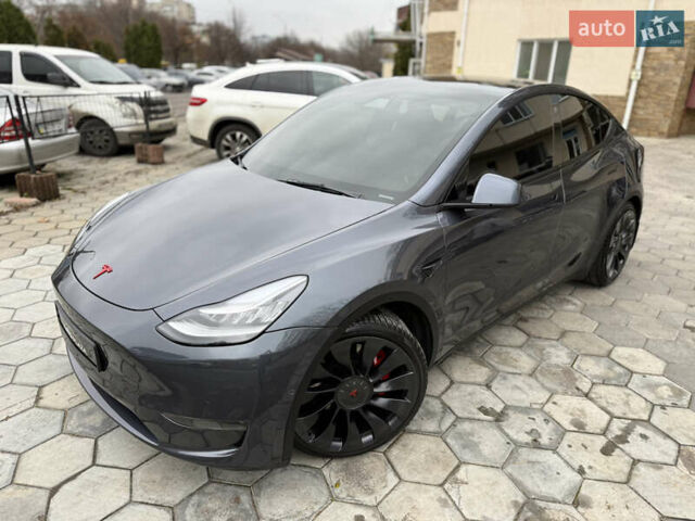 Серый Тесла Model Y, объемом двигателя 0 л и пробегом 53 тыс. км за 28000 $, фото 5 на Automoto.ua