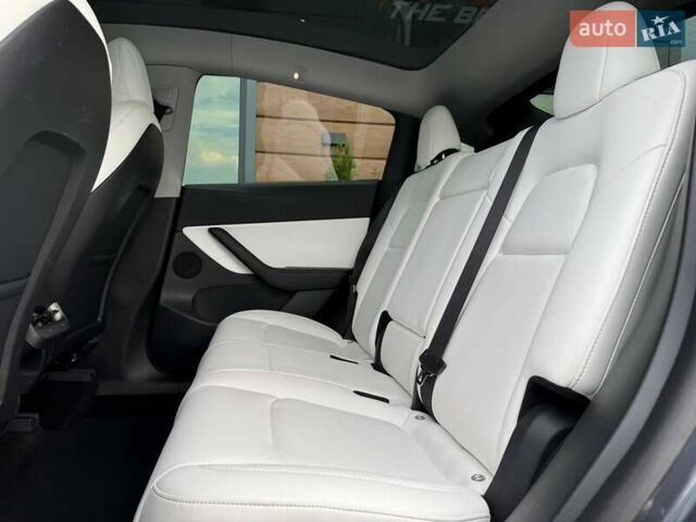 Серый Тесла Model Y, объемом двигателя 0 л и пробегом 85 тыс. км за 23900 $, фото 45 на Automoto.ua