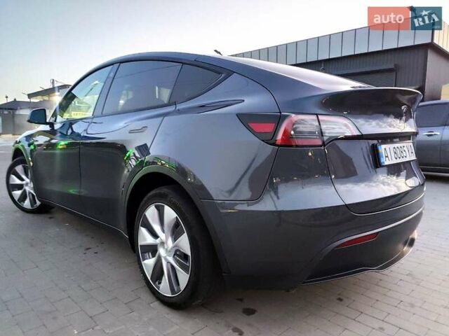 Серый Тесла Model Y, объемом двигателя 0 л и пробегом 74 тыс. км за 26999 $, фото 11 на Automoto.ua