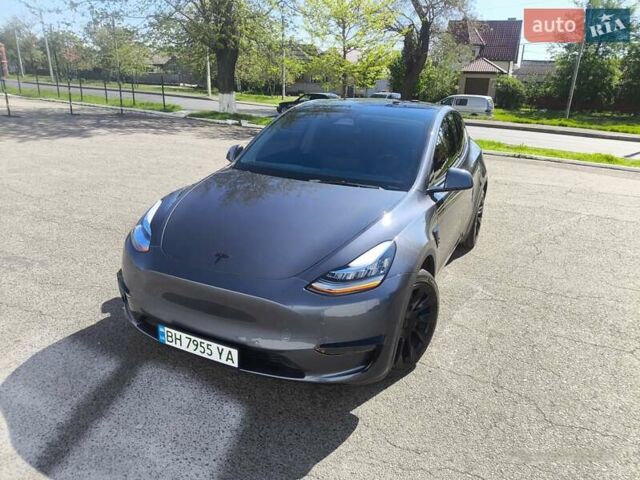 Серый Тесла Model Y, объемом двигателя 0 л и пробегом 77 тыс. км за 30999 $, фото 7 на Automoto.ua