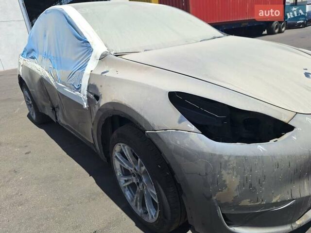 Серый Тесла Model Y, объемом двигателя 0 л и пробегом 86 тыс. км за 17300 $, фото 1 на Automoto.ua