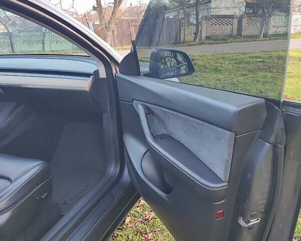 Серый Тесла Model Y, объемом двигателя 0 л и пробегом 160 тыс. км за 24500 $, фото 20 на Automoto.ua