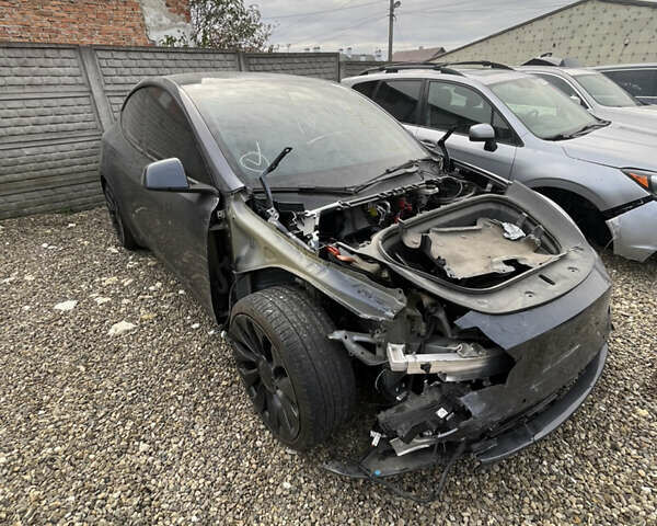 Серый Тесла Model Y, объемом двигателя 0 л и пробегом 99 тыс. км за 19600 $, фото 3 на Automoto.ua