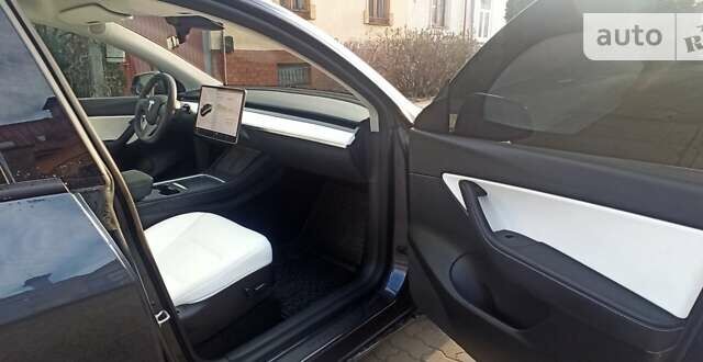 Серый Тесла Model Y, объемом двигателя 0 л и пробегом 35 тыс. км за 29950 $, фото 17 на Automoto.ua