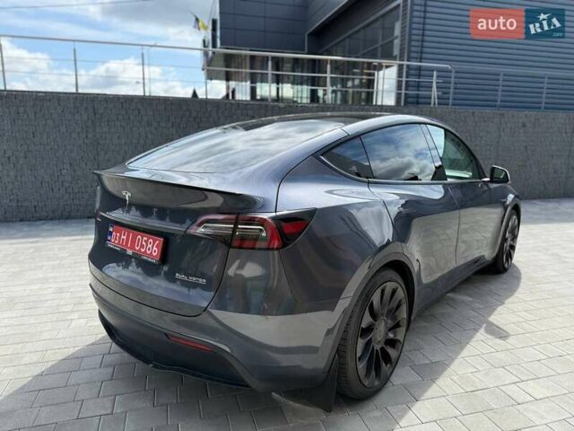 Серый Тесла Model Y, объемом двигателя 0 л и пробегом 93 тыс. км за 23400 $, фото 2 на Automoto.ua