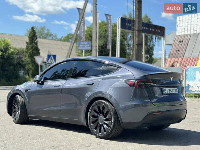 Серый Тесла Model Y, объемом двигателя 0 л и пробегом 5 тыс. км за 27950 $, фото 3 на Automoto.ua