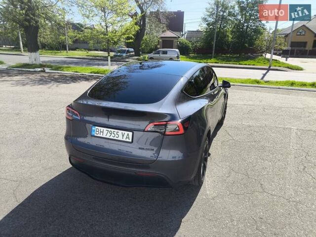 Серый Тесла Model Y, объемом двигателя 0 л и пробегом 77 тыс. км за 30999 $, фото 22 на Automoto.ua