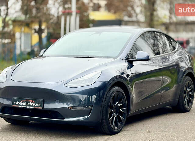 Серый Тесла Model Y, объемом двигателя 0 л и пробегом 130 тыс. км за 25999 $, фото 3 на Automoto.ua