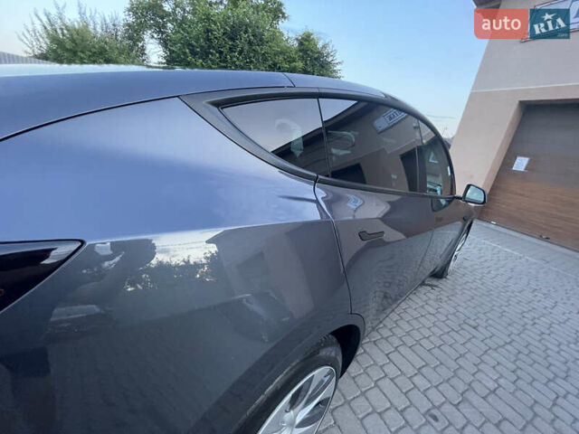 Сірий Тесла Model Y, об'ємом двигуна 0 л та пробігом 59 тис. км за 26900 $, фото 3 на Automoto.ua