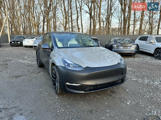 Серый Тесла Model Y, объемом двигателя 0 л и пробегом 65 тыс. км за 19300 $, фото 14 на Automoto.ua