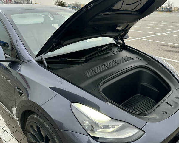 Серый Тесла Model Y, объемом двигателя 0 л и пробегом 58 тыс. км за 28500 $, фото 24 на Automoto.ua