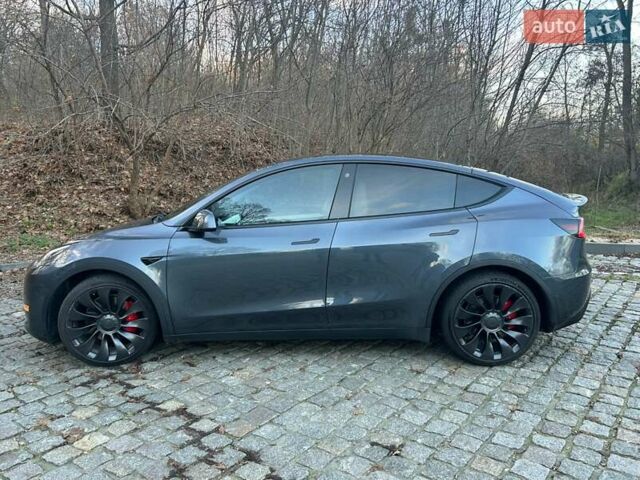 Серый Тесла Model Y, объемом двигателя 0 л и пробегом 53 тыс. км за 31500 $, фото 2 на Automoto.ua
