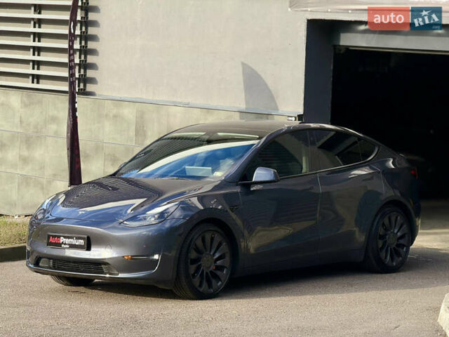 Серый Тесла Model Y, объемом двигателя 0 л и пробегом 54 тыс. км за 26000 $, фото 2 на Automoto.ua