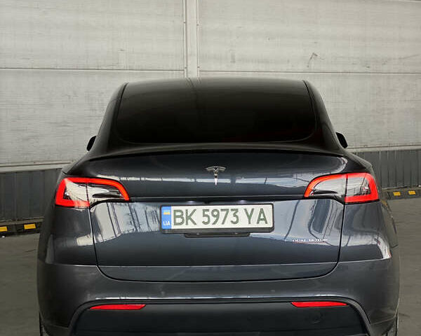 Серый Тесла Model Y, объемом двигателя 0 л и пробегом 64 тыс. км за 26300 $, фото 2 на Automoto.ua