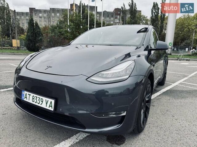 Серый Тесла Model Y, объемом двигателя 0 л и пробегом 61 тыс. км за 25500 $, фото 1 на Automoto.ua
