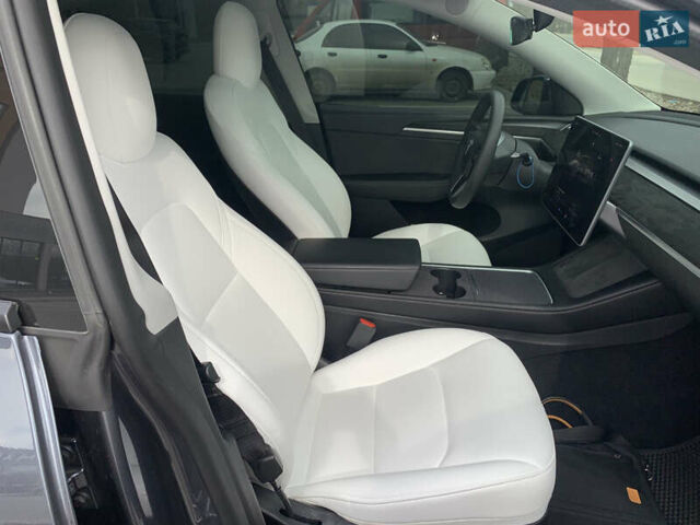 Серый Тесла Model Y, объемом двигателя 0 л и пробегом 29 тыс. км за 32700 $, фото 15 на Automoto.ua