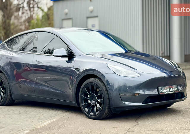 Серый Тесла Model Y, объемом двигателя 0 л и пробегом 130 тыс. км за 25999 $, фото 2 на Automoto.ua